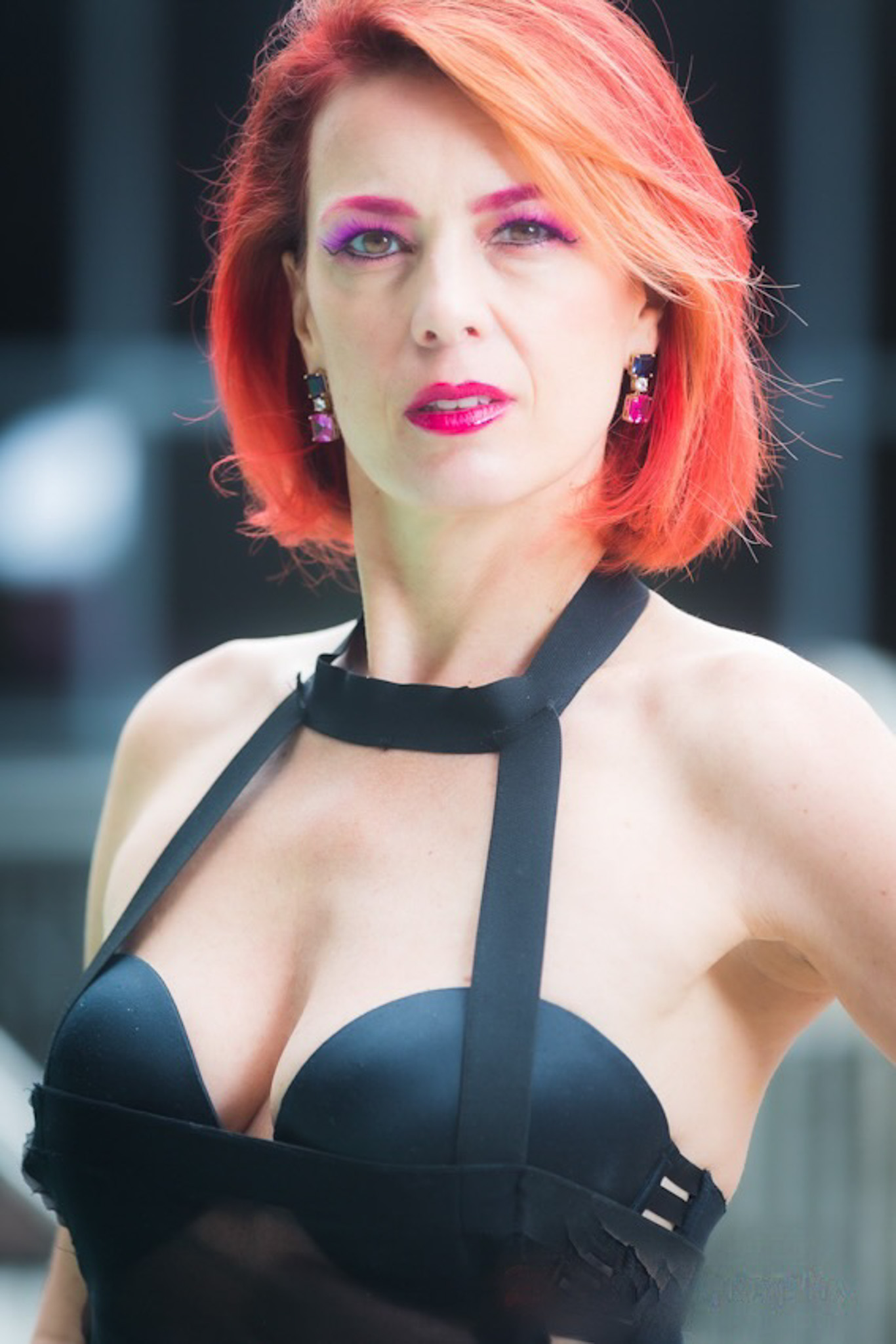 Viktoria Sway, direct portrait in black harness top, Manhattan Dominatrix and life coach